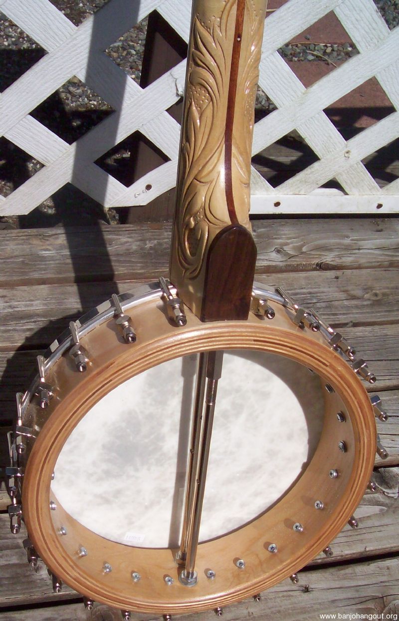 Long Neck Banjo with a Rolled Brass Tone Ring for right and left handed