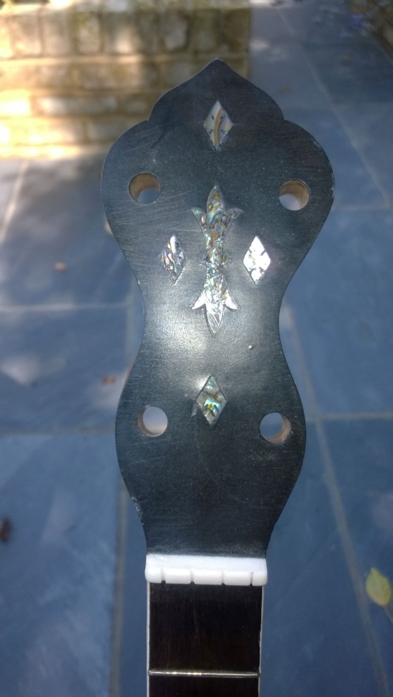 front of reamed banjo headstock
