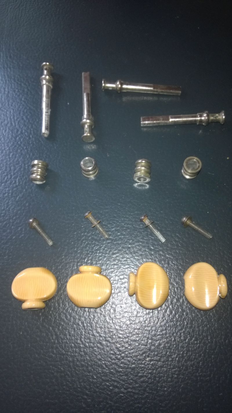 disassembled friction banjo tuners