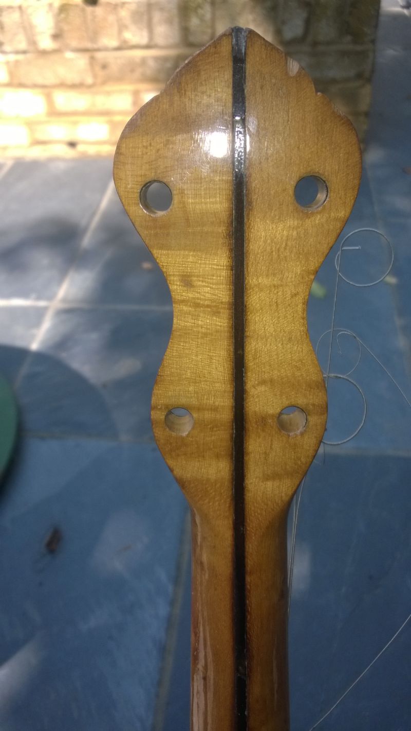 back of reamed banjo headstock