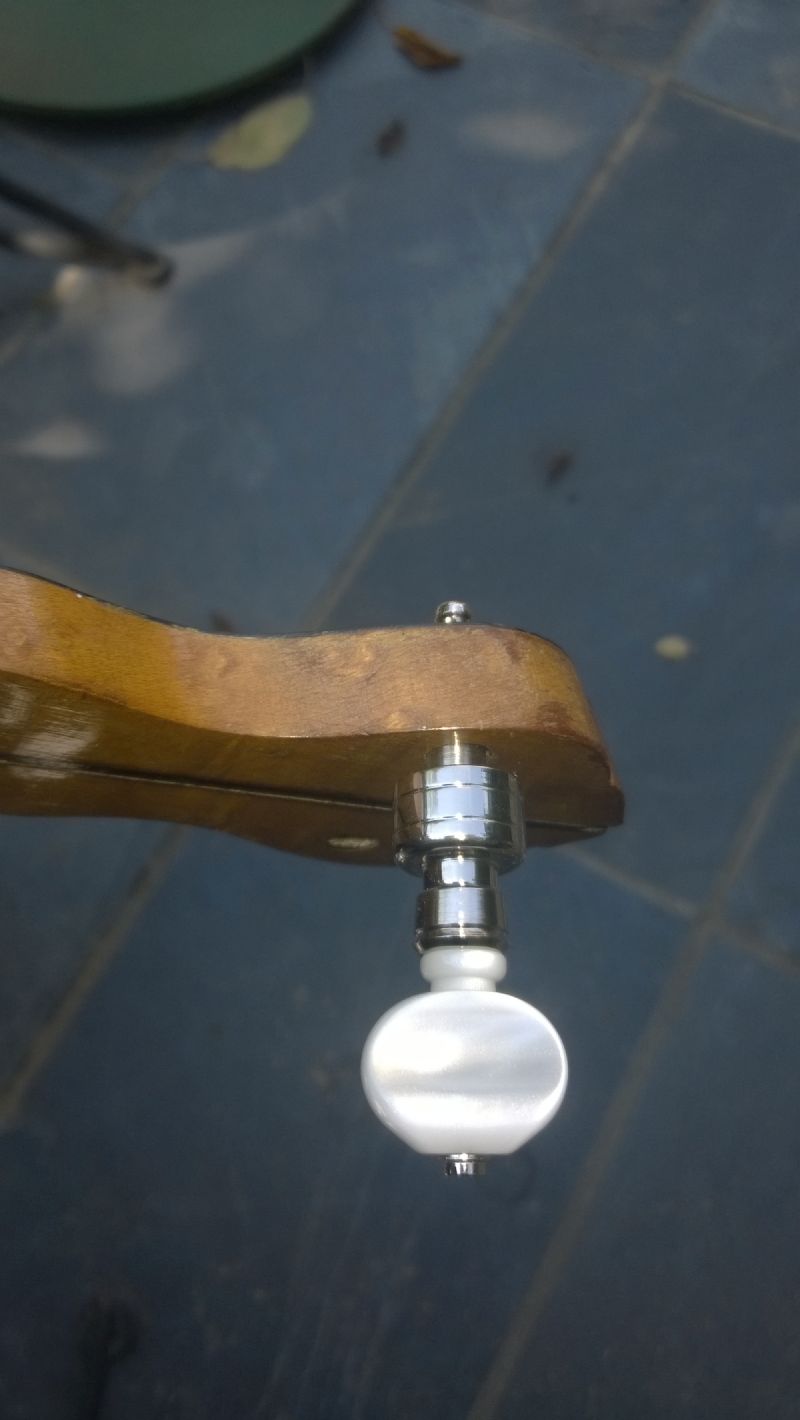 geared banjo tuner being fitted