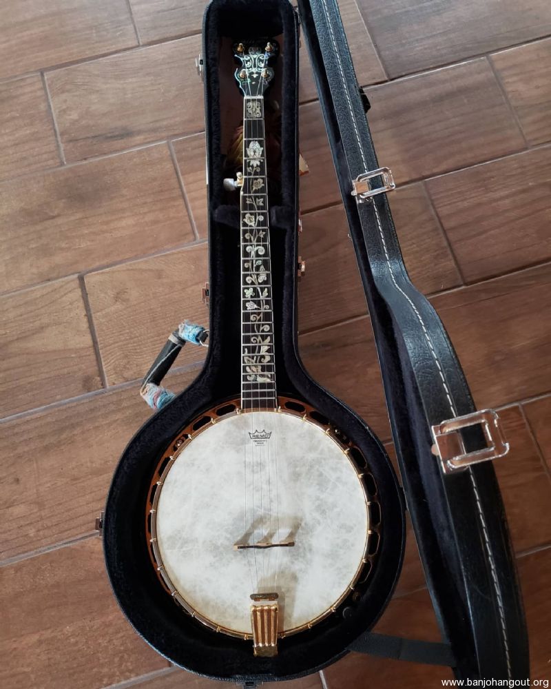morgan monroe banjo with a ship inlay on resonator morgan monroe banjo with a ship inlay on resonator