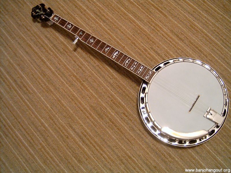 **Sold pending payment** CLANCY MULLINS WALNUT CUSTOM MADE 5 STRING RESONATOR BANJO AND CASE
