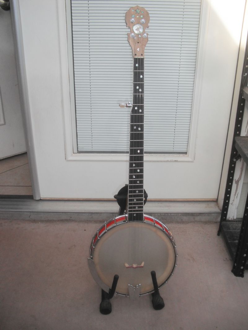 Should I remove the resonator and flange from my Fender FB59